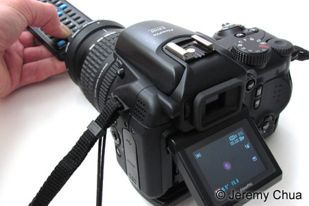 The pinkish infrared illumination from the LED of a TV/DVD remote control is seen by a digital camera fitted with a Hoya R72 filter.